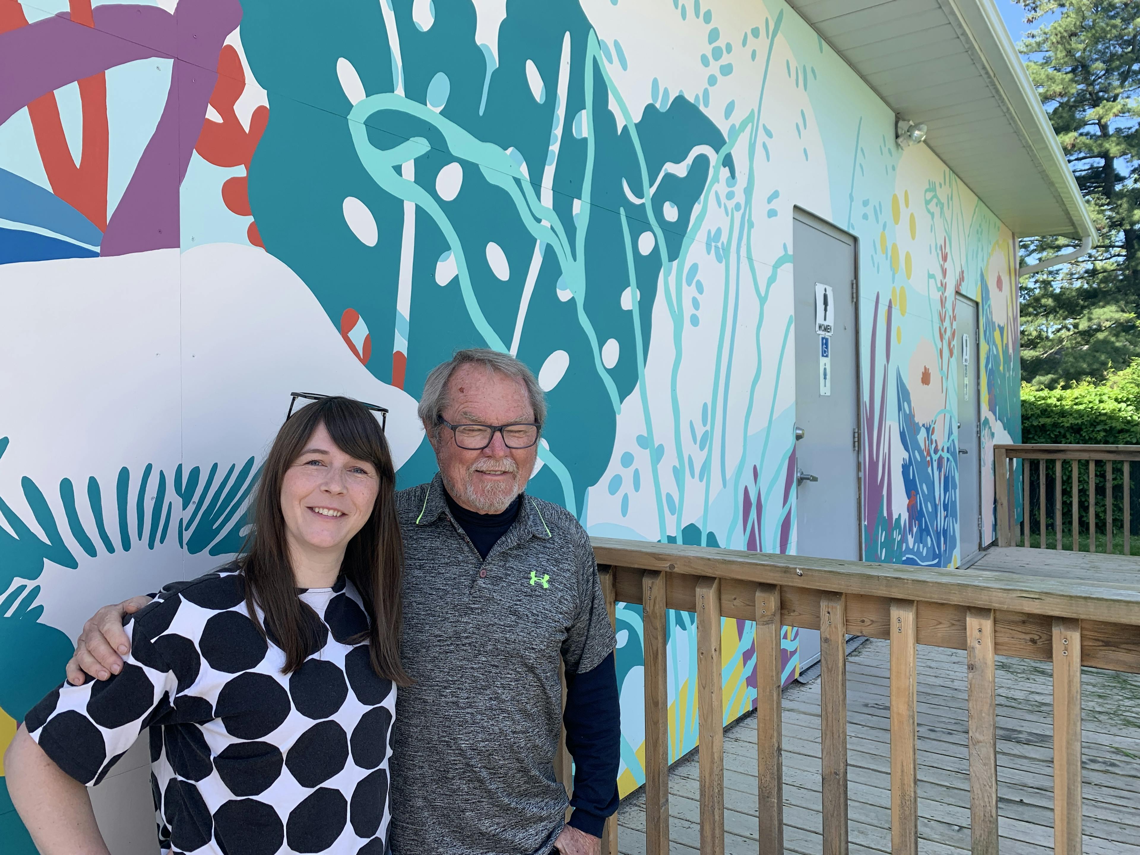 <p>Muralist Chrissy Poitras and Bloomfield Town Hall Lower Level Board of Management Chair Rob Leek. (Jason Parks/Gazette Staff)</p>
