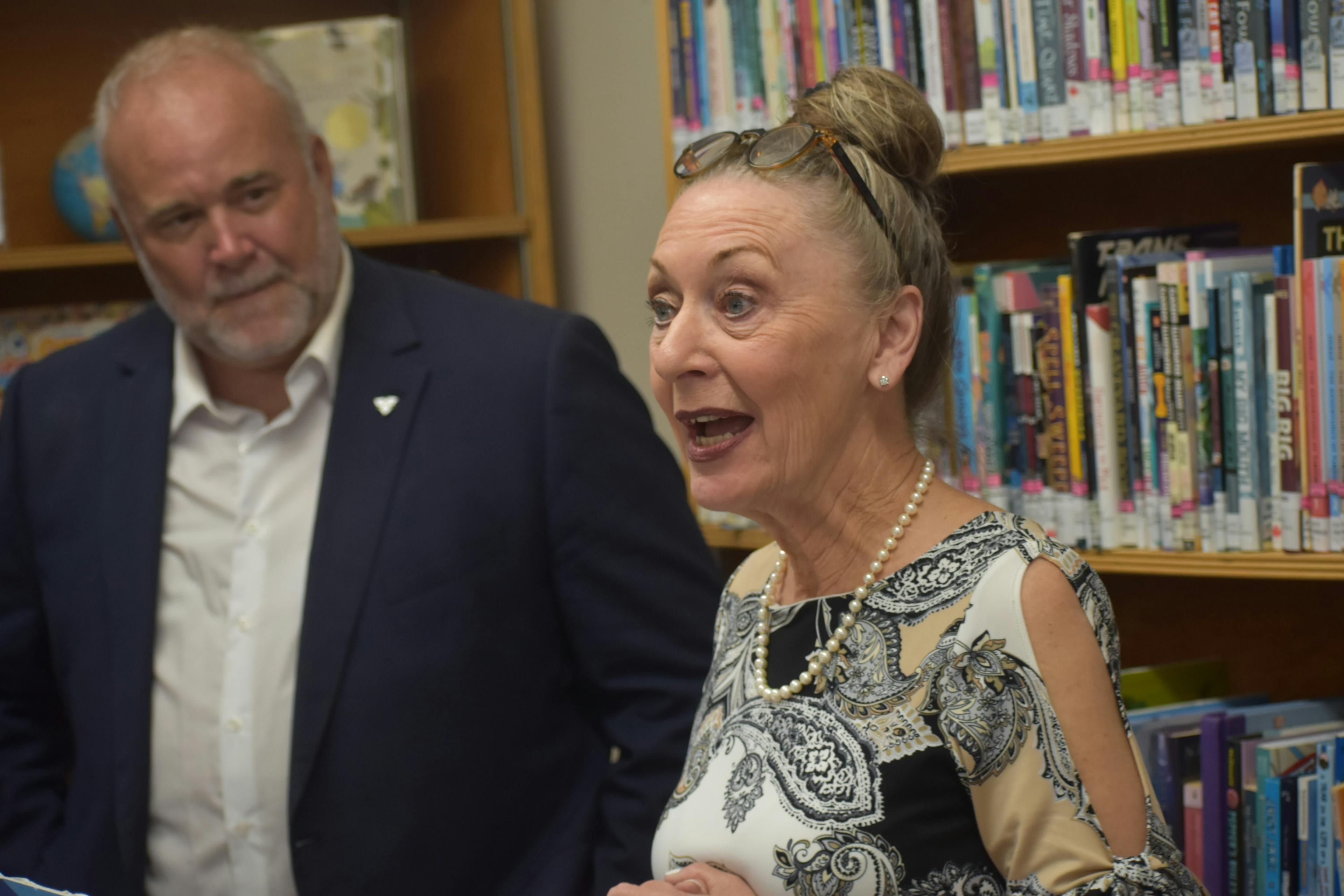 <p>Bay of Quinte MPP Todd Smith listens on as Prince Edward County Public Library and Archives CEO Barbara Sweet explains how a Seniors Community Grant from the Government of Ontario will benefit the local library system. (Jason Parks/Gazette Staff)</p>
