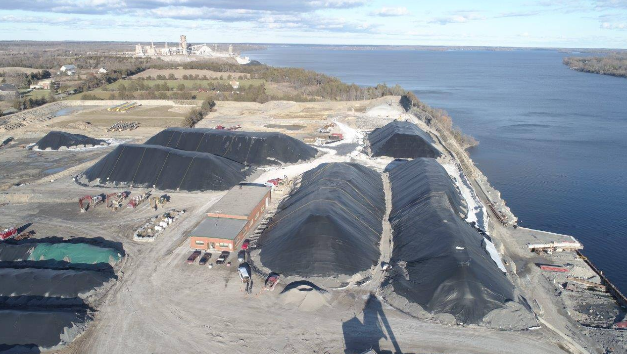 <p>UNDER WRAPS- Piles of road salt for winter driving applications are tarped in this November 29,  2017 ariel photo of Picton Terminals. (Picton Terminals photo)</p>
