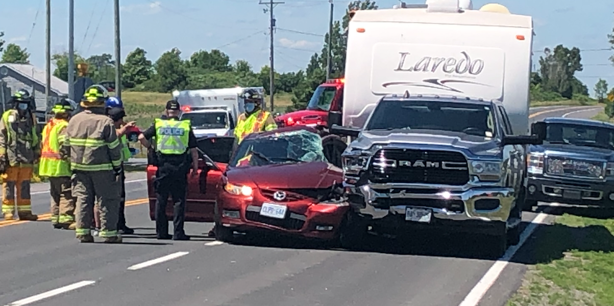 <p>Prince Edward OPP and local first responders attend a motor vehicle crash at the intersection of County Rd. 1 and Highway 62 in the summer of 2021. (Jason Parks/Gazette Staff)</p>
